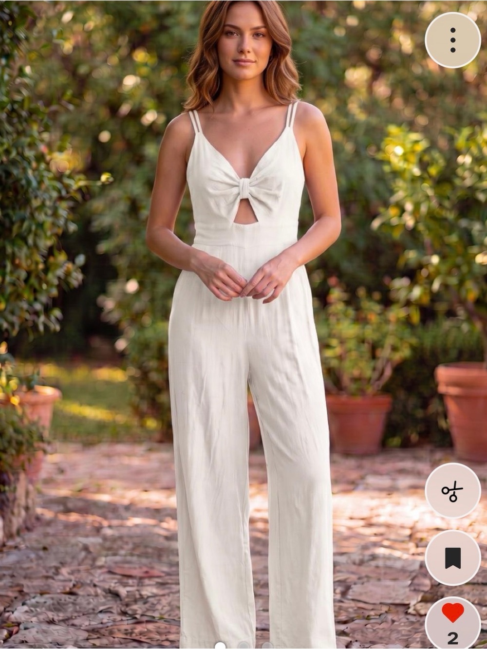 White Knot-Front Linen Jumpsuit elastic waist elastic back. Adjuster straps.